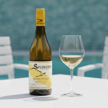 Load image into Gallery viewer, AA Badenhorst Secateurs Chenin Blanc wine bottle with a glass of wine on a table by a pool