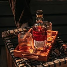 Load image into Gallery viewer, Bottle Aberlour 12 year old cask whisky on a wooden tray with glasses, set against a dark background