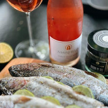 Load image into Gallery viewer, Bottle of Amisfield rosé wine with fish and lime slices on a plate
