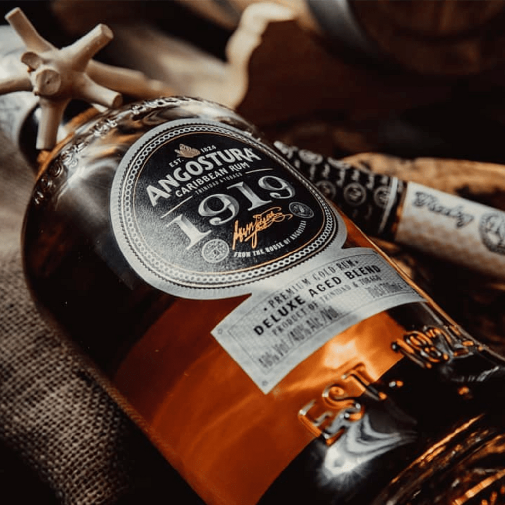 Bottle of Angostura 1919 aged rum on a textured surface