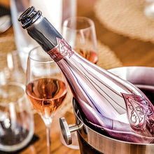 Load image into Gallery viewer, A bottle of champagne in a pink bottle in a ice bucket n a wooden table