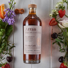 Load image into Gallery viewer, Arran Sherry Cask Scotch Whisky bottle with fruits and flowers on a light gray background