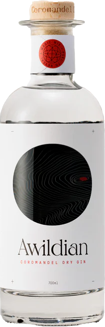 Awildian coromandel dry gin bottle with a white label and cork cap.