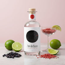 Load image into Gallery viewer, Awildian coromandel dry gin bottle with limes, berries, and a cocktail on a light pink background