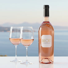Load image into Gallery viewer, Bottle of BY OTT rosé Magnum wine with two glasses against a scenic background