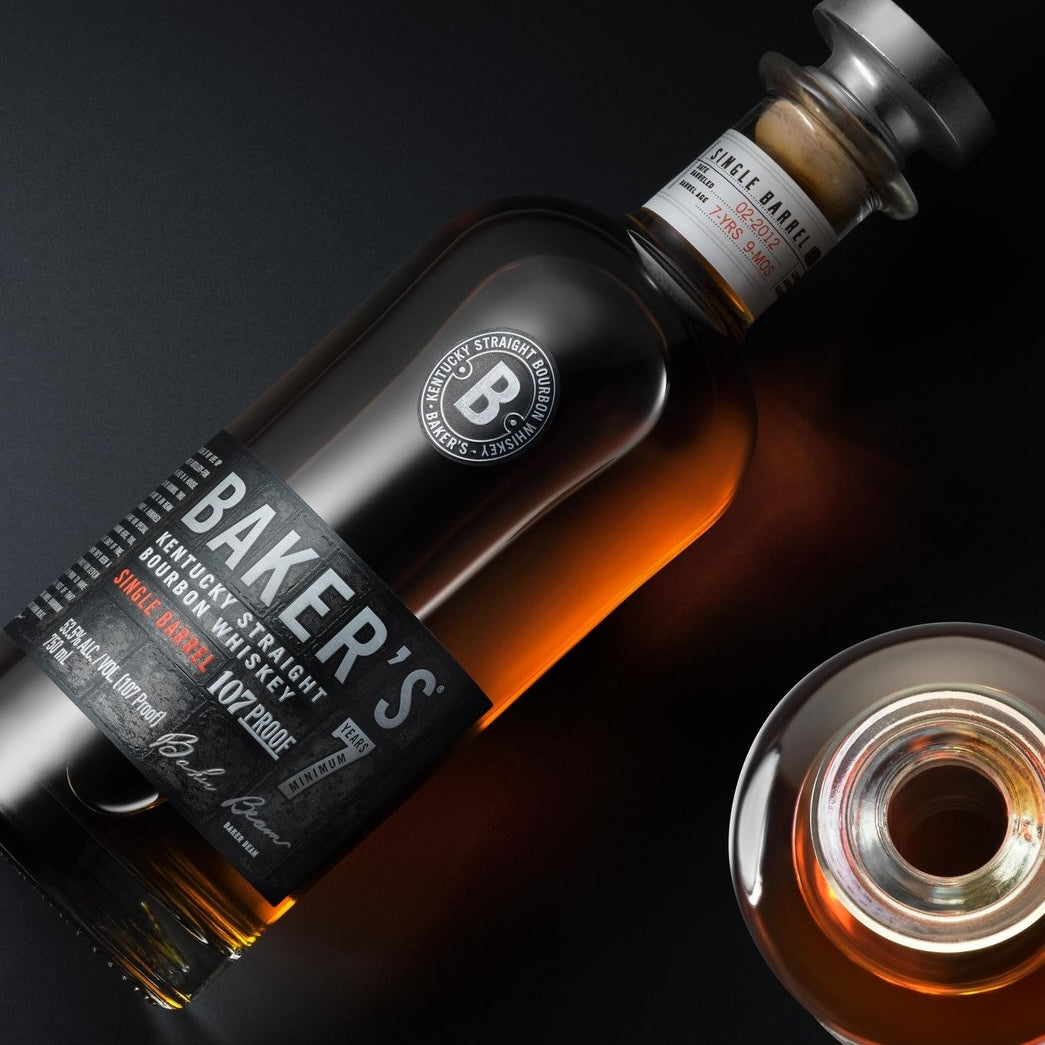 Load image into Gallery viewer, Baker's 7YO Single Barrel Kentucky Bourbon on a dark background 