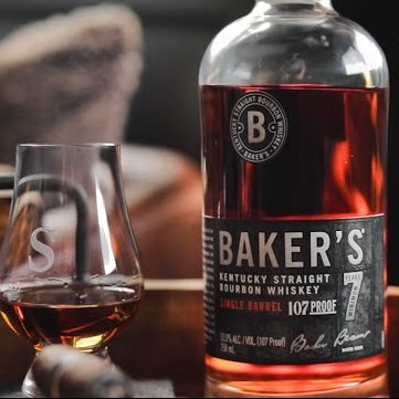 Load image into Gallery viewer, Baker's 7YO Single Barrel Kentucky Bourbon with a tumbler of neat bourbon