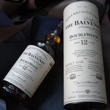 Load image into Gallery viewer, Two bottles of Balvenie Doublewood whisky on a textured surface
