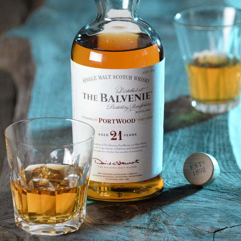 Load image into Gallery viewer, Whisky bottle with two glasses on a wooden surface