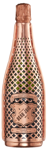 An image of a bottle of Beau Joie Brut Champagne 750ml in its stunning copper metal jacket.