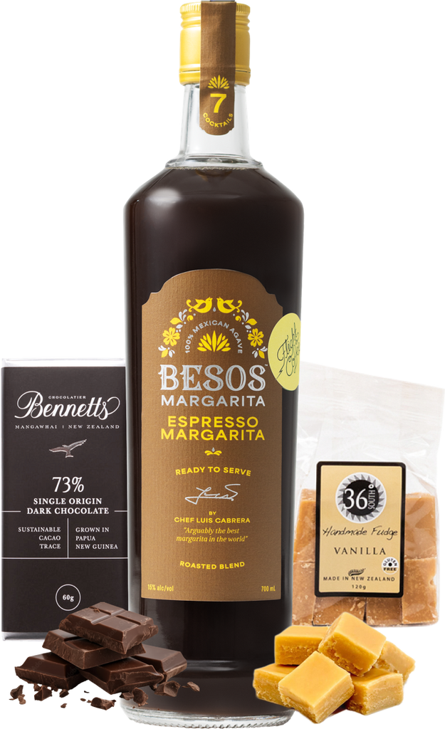 Bottle of Besos Espresso Margarita with chocolate and vanilla products in the background