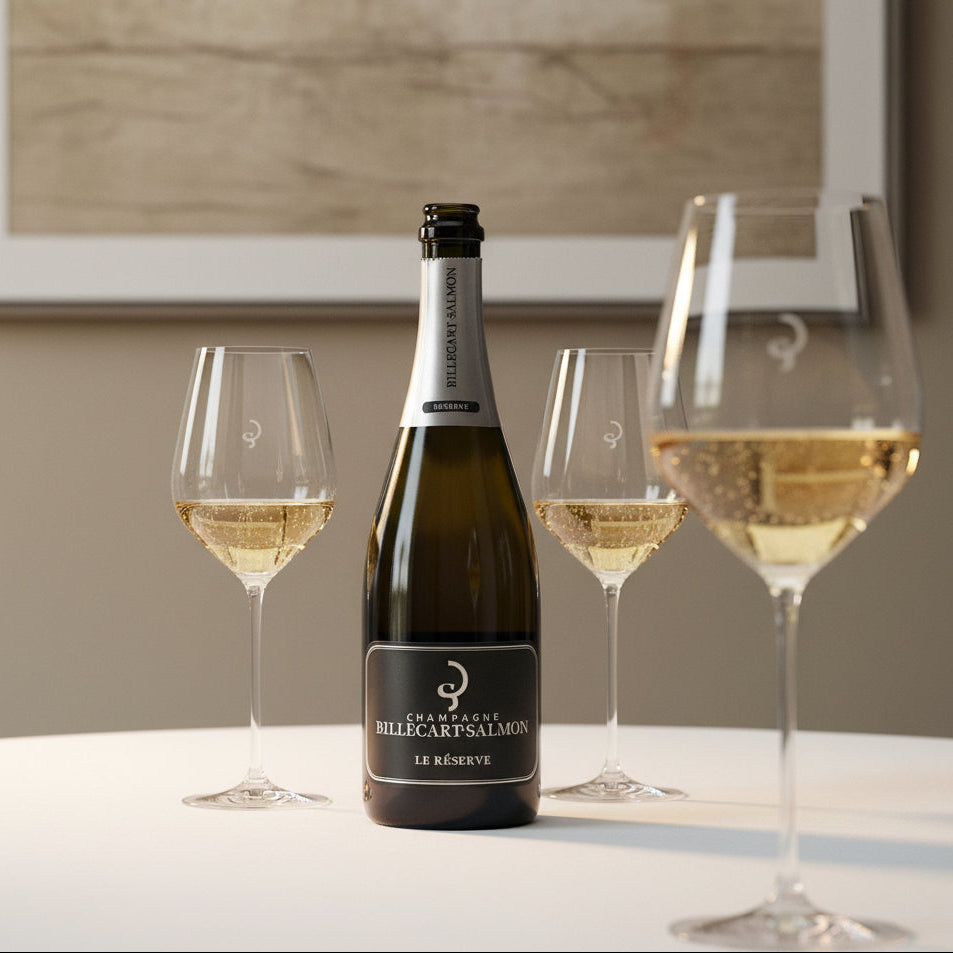 Load image into Gallery viewer, Bottle of Billecart-Salmon Le Reserve Champagne with three glasses on a table against a neutral background