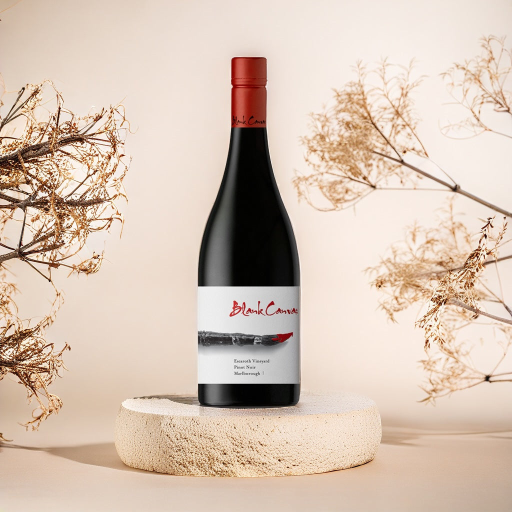 Load image into Gallery viewer, Wine bottle with a red cap on a white background