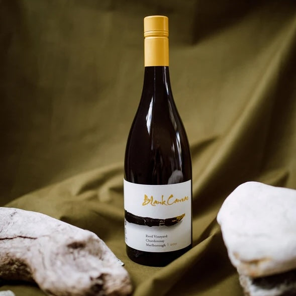 Load image into Gallery viewer, A bottle of Blank Canvas Holdaway Sauvignon Blanc on a green background