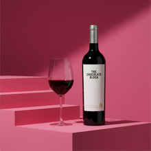 Load image into Gallery viewer, A bottle of Boekenhoutskloof_The_Chocolate_Block_Red_Blend wine on a pink stair case  background