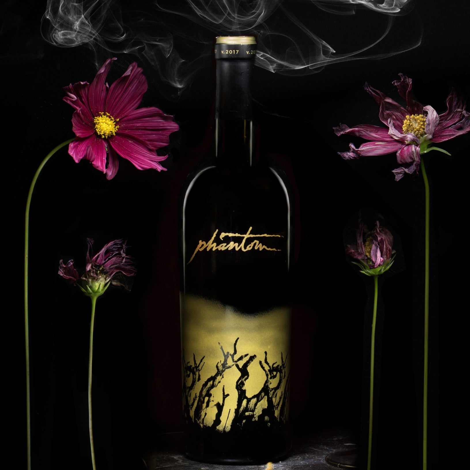 Load image into Gallery viewer, Bogle Phantom Proprietary Red Blend Wine bottle SURROUNDED BY PINK FLOWERS AND SMOKE