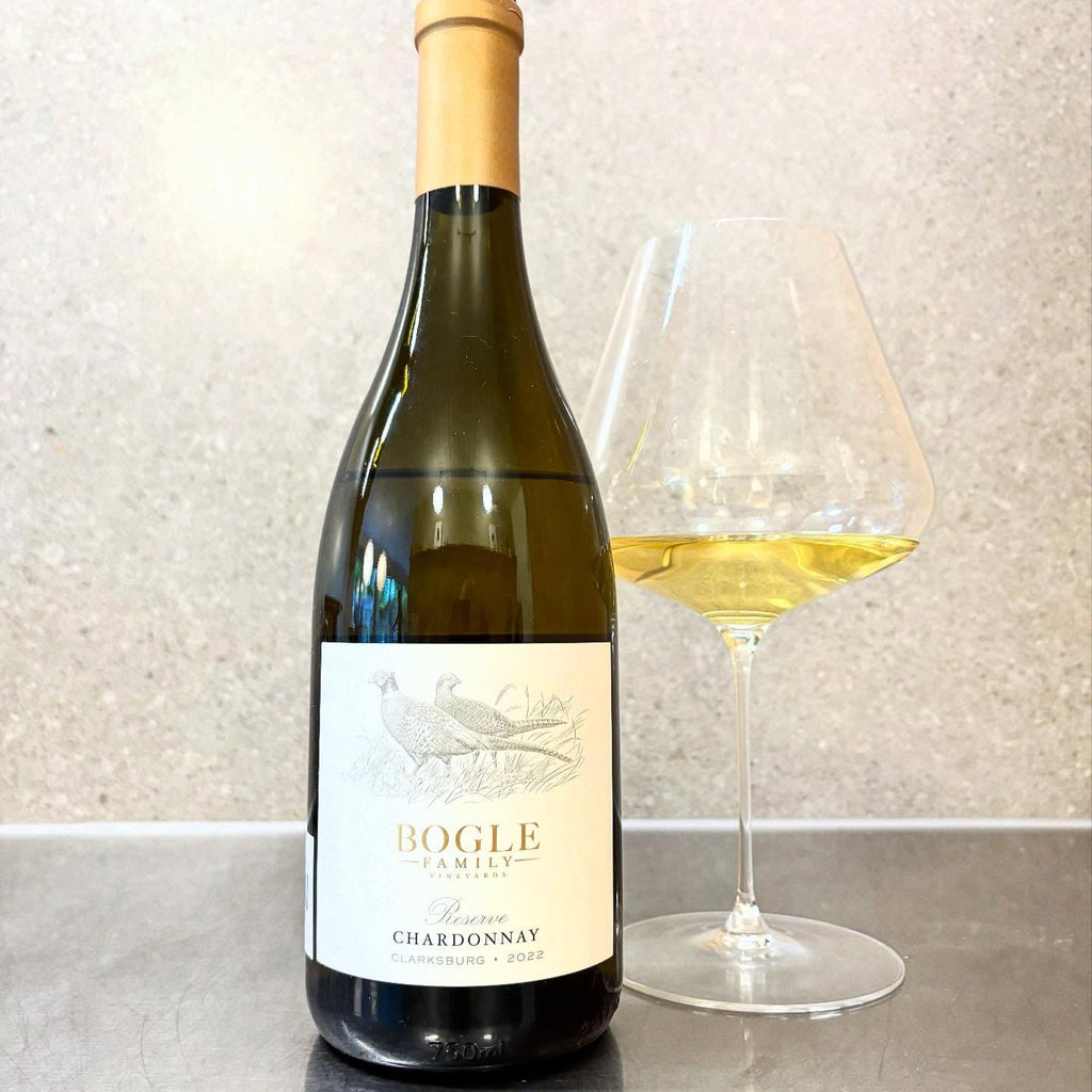 Bottle of Bogle Chardonnay with a glass of wine on a countertop