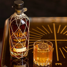 Load image into Gallery viewer, Brick 1888 rum bottle and glass on a decorative tray with &#39;Enjoy Responsibly&#39; text.