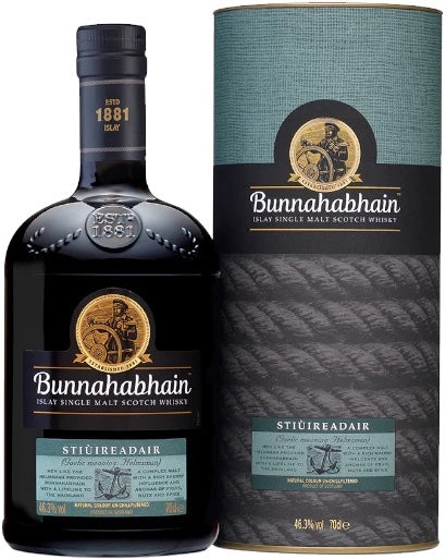 An image of a bottle of Bunnahabhain Stiuireadair Single Malt Scotch Whisky Limited Edition next to its gift tube box