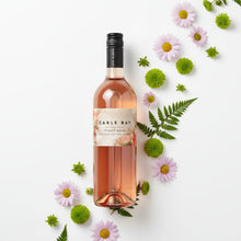 Load image into Gallery viewer, Bottle of Cable Bay Pinot Rosé surrounded by flowers and leaves on a white background