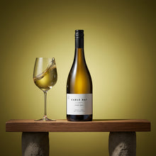 Load image into Gallery viewer, Bottle of Cable Bay Reserve Pinot Gris wine with a glass of wine on a wooden stand against a yellow background