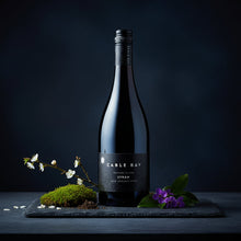 Load image into Gallery viewer, Wine bottle of Cable Bay Waiheke Island Syrah on a dark background