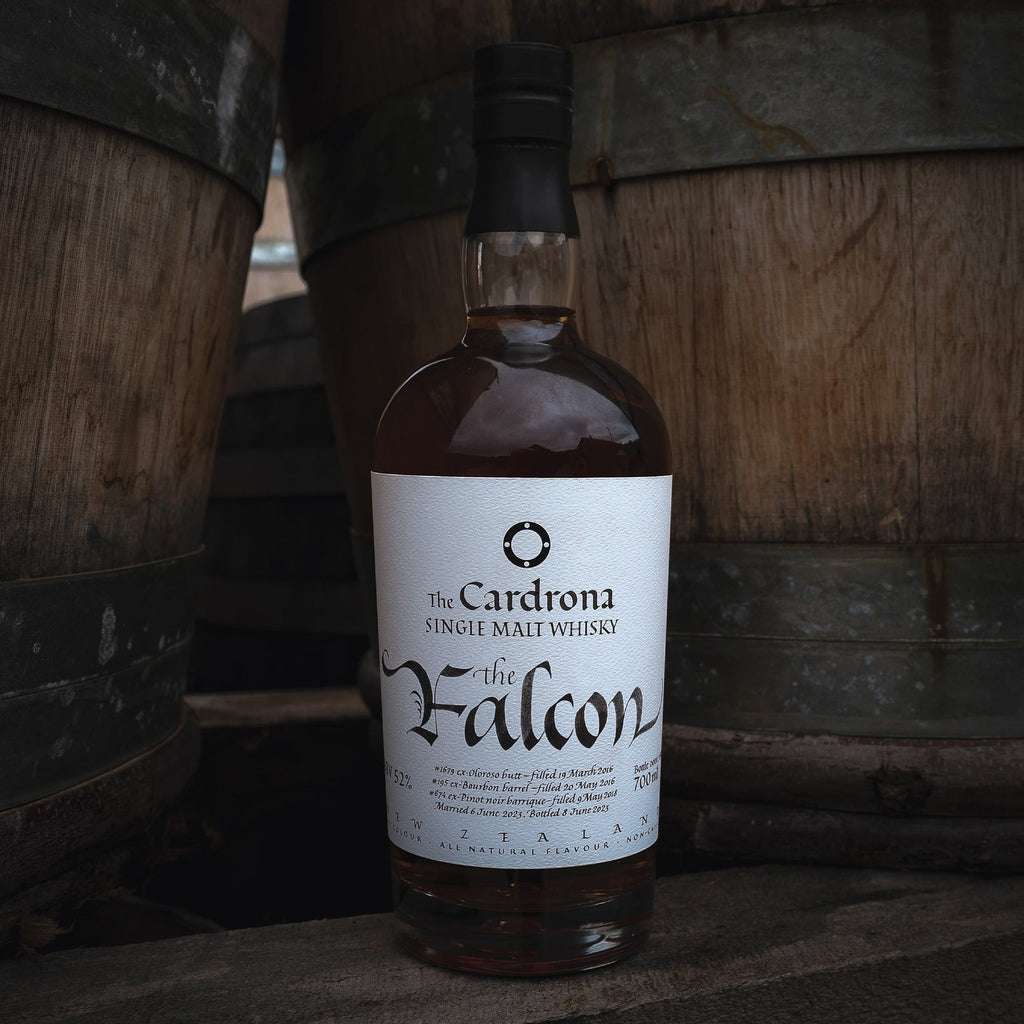 Bottle of Cardrona The Falcon Single Malt Whisky against a wooden background