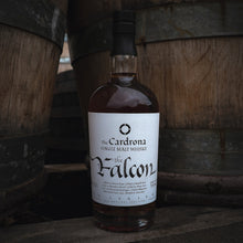 Load image into Gallery viewer, Bottle of Cardrona The Falcon Single Malt Whisky against a wooden background