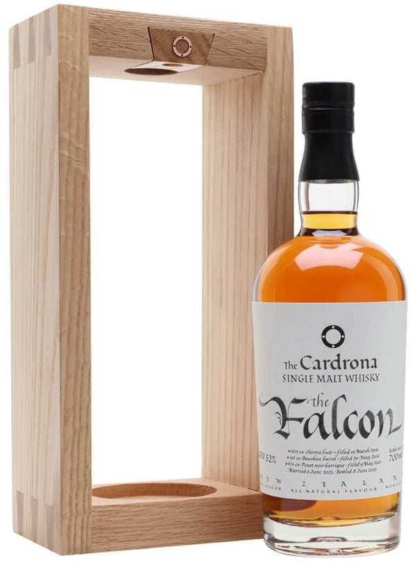 An image of a bottle of Cardrona's new  'The Falcon' Single Malt Whisky 700ml next to its beautiful gift oak frame.