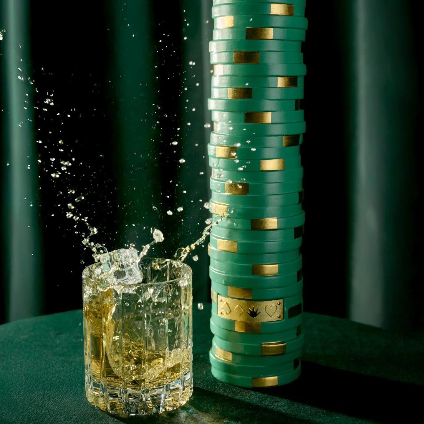 Load image into Gallery viewer, A bottle of CasAzar Reposado Tequila next to a glass of tequila on a dark background