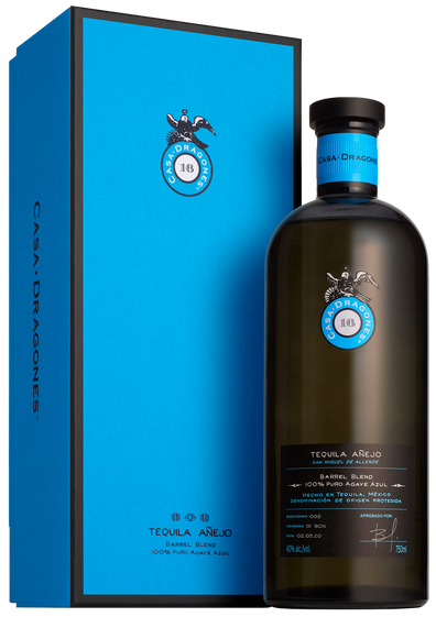 Load image into Gallery viewer, An image of a stunning bottle of ultra-premium Casa Dragones Barrel Blend Anejo Tequila 700ml next to its beautiful gift box