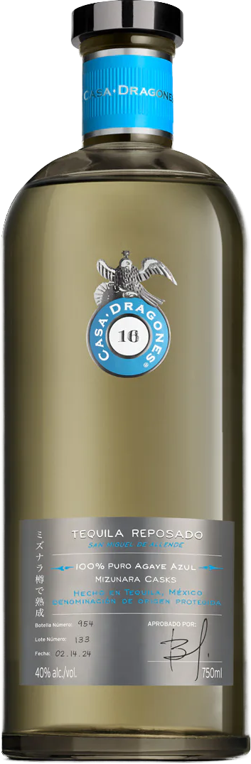 Load image into Gallery viewer, A bottle of Casa Dragones Reposado Mizunara Tequila, featuring a clear glass bottle with a golden-amber liquid, a black cap, a blue neck label, and a grey lower label with the brand's eagle logo.