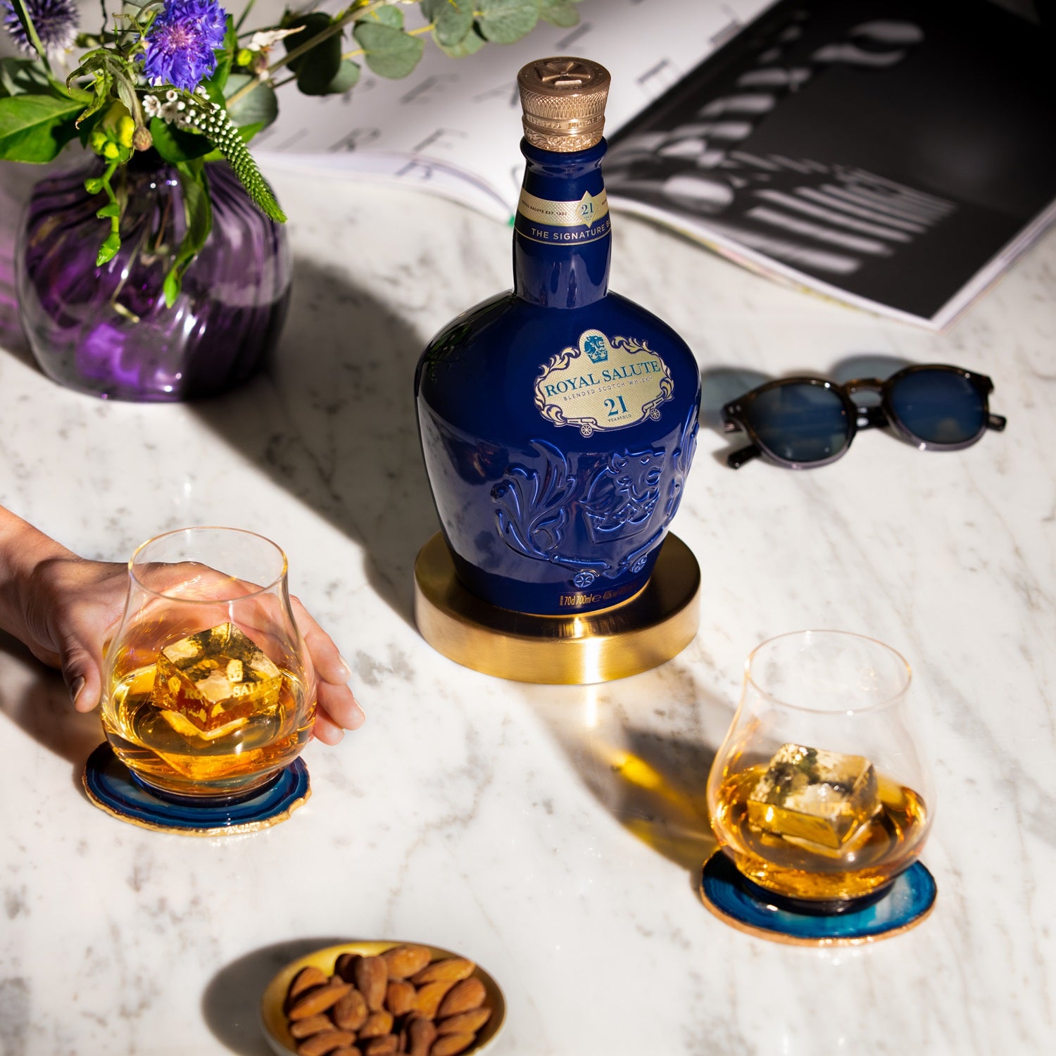 Load image into Gallery viewer, Bottle of Chivas Regal Royal Salute 21 Year Old Signature Blend Scotch Whisky with two glasses on a marble surface.