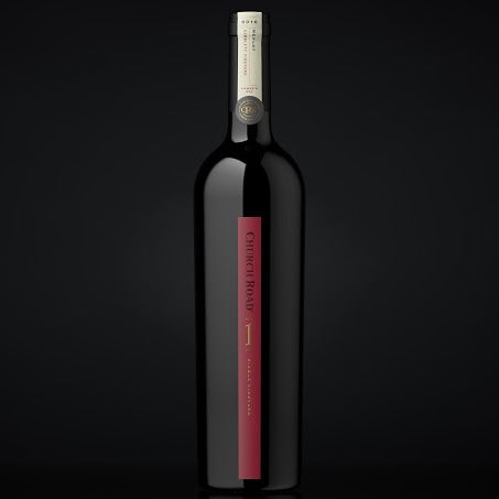 Load image into Gallery viewer, A bottle of Church Road 1 Merlot on a black background