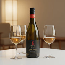 Load image into Gallery viewer, A bottle of Church Road Grand Reserve Chardonnay  next to three half full wine glasses