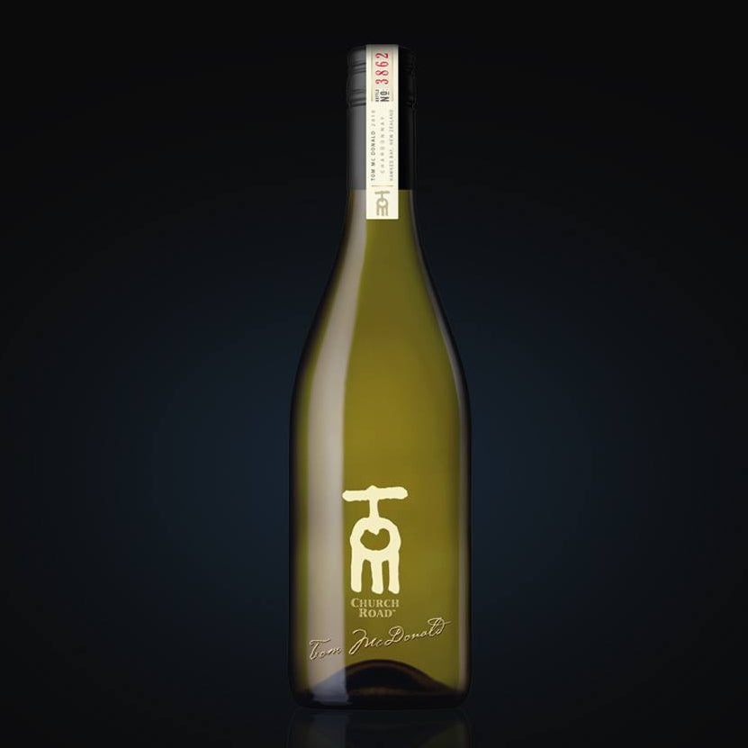 Load image into Gallery viewer, Church Road TOM Chardonnay wine bottle with a label on a black background