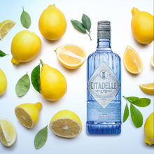 Load image into Gallery viewer, Citadelle gin bottle surrounded by lemons on a white background