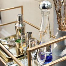 Load image into Gallery viewer, Bartending setup with glasses, Clase Azul Plata Tequila bottle, and shaker on a mirrored bar cart.