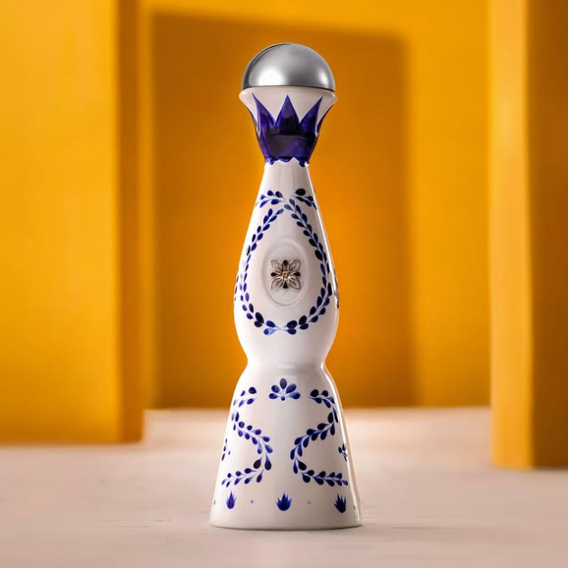 Load image into Gallery viewer, A bottle of Clase Azul Reposado Tequila n a yellow room