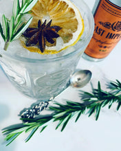 Load image into Gallery viewer, An image of a beautiful cocktail with a dehydrated lemon slice garnish