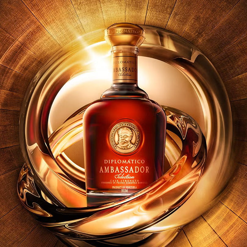Load image into Gallery viewer, Bottle of Diplomatico Ambassador Selection Rum in a wooden barrel