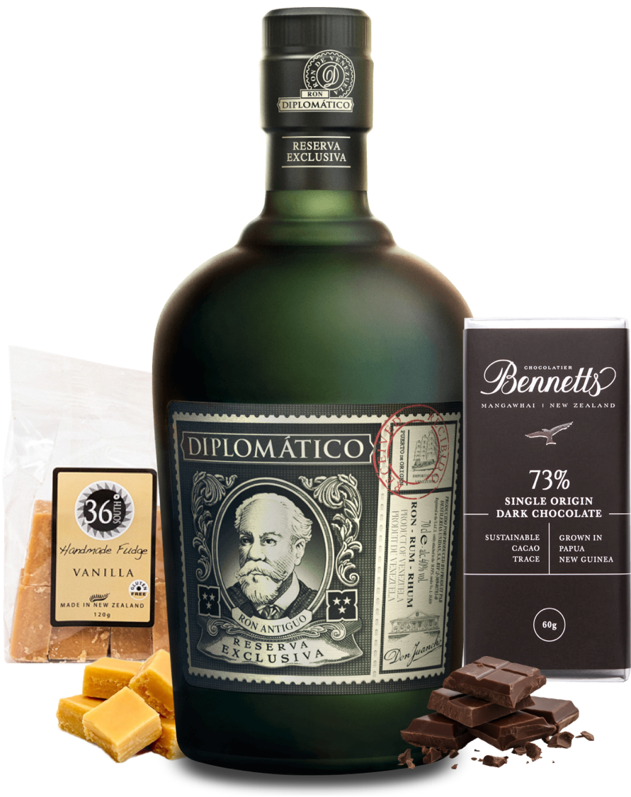 Load image into Gallery viewer, Bottle of Diplomatico Reserva Exclusiva rum with chocolate and vanilla products on a white background