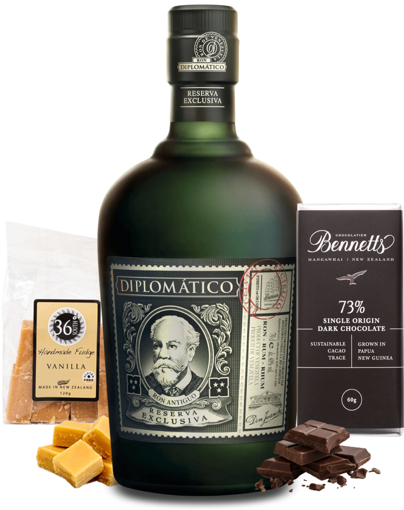 Bottle of Diplomatico Reserva Exclusiva rum with chocolate and vanilla products on a white background