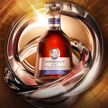 Load image into Gallery viewer, Diplomatico rum bottle on a reflective surface with wooden background