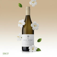 Load image into Gallery viewer, A bottle of Dog Point Sauvignon Blanc surrounded by white flowers on a beige background