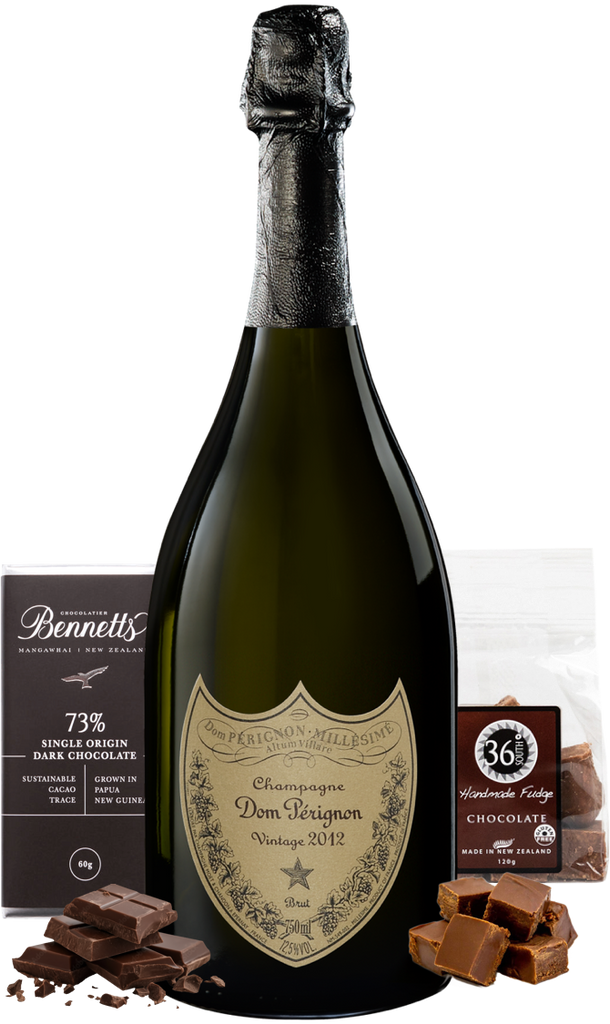 Bottle of Dom Perignon champagne with chocolate products on a white background