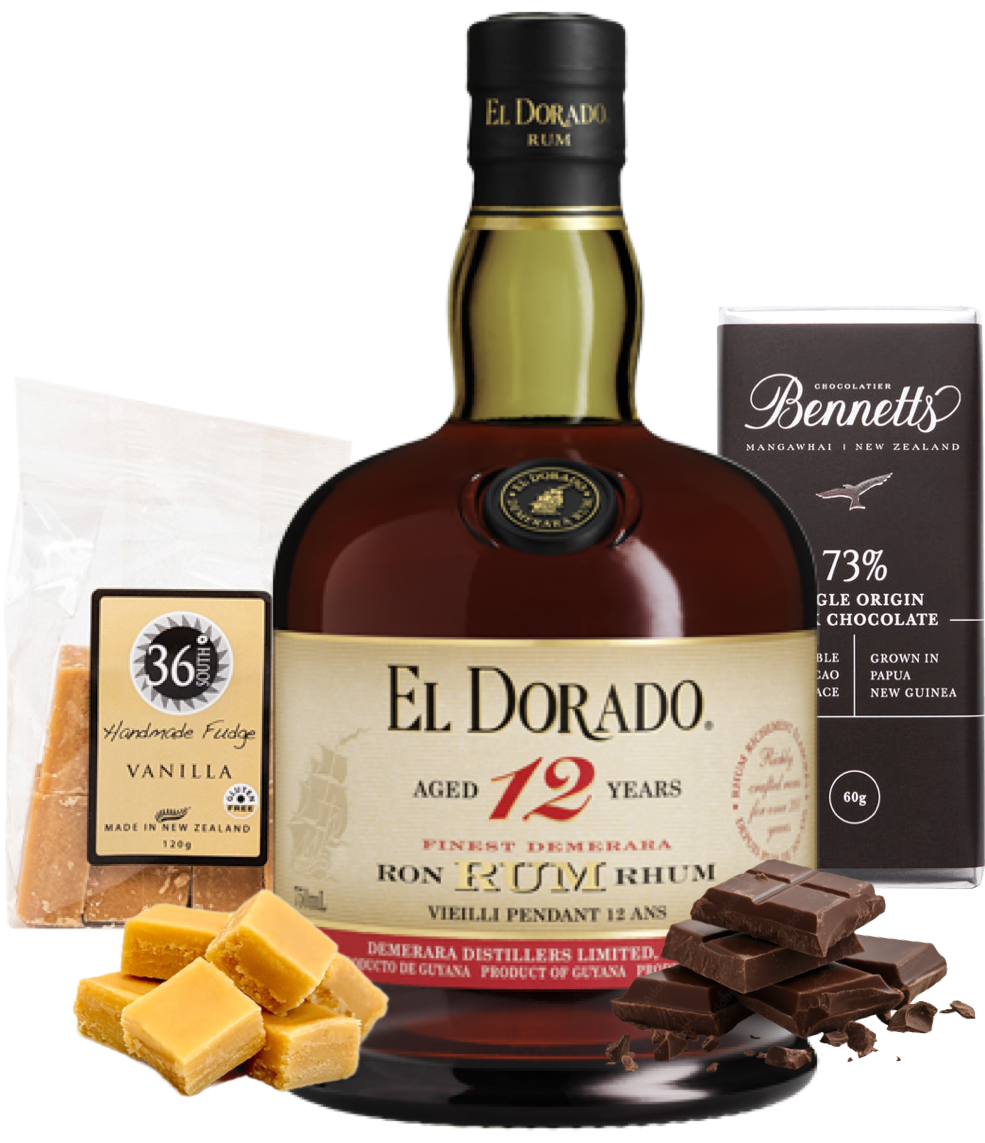 Load image into Gallery viewer, El Dorado 12 year old rum bottle with chocolate, vanilla candy, and a box of Bennett's chocolate on a white background
