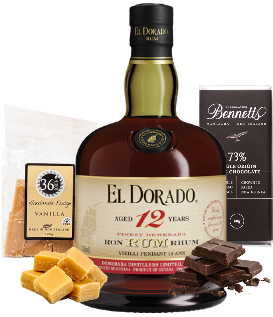 El Dorado 12 year old rum bottle with chocolate, vanilla candy, and a box of Bennett's chocolate on a white background