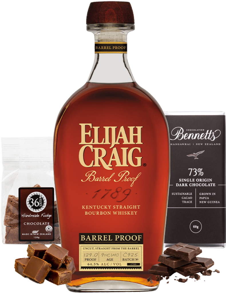 A bottle of Elijah Craig Barrel Proof Kentucky Straight Bourbon Whiskey centred on a white background, with Bennetts chocolate packet and pieces and 36 Degrees chocolate fudge packet and chocolate fudge pieces arranged around it. 