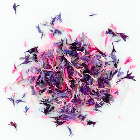 Load image into Gallery viewer, Colourful FN Edible Stellar Florets petals artistically scattered on white background